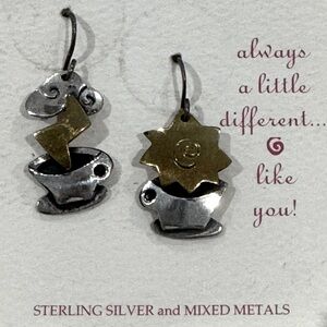 Hand forged pierced earrings of sterling silver and mixed metals
